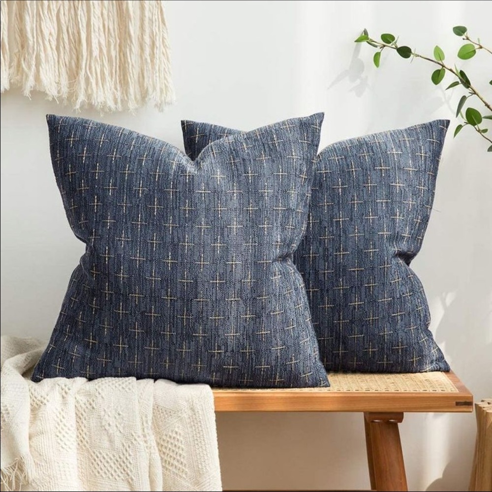 Two navy linen pillows 18x18 with feather insert. Zipper on bottom.